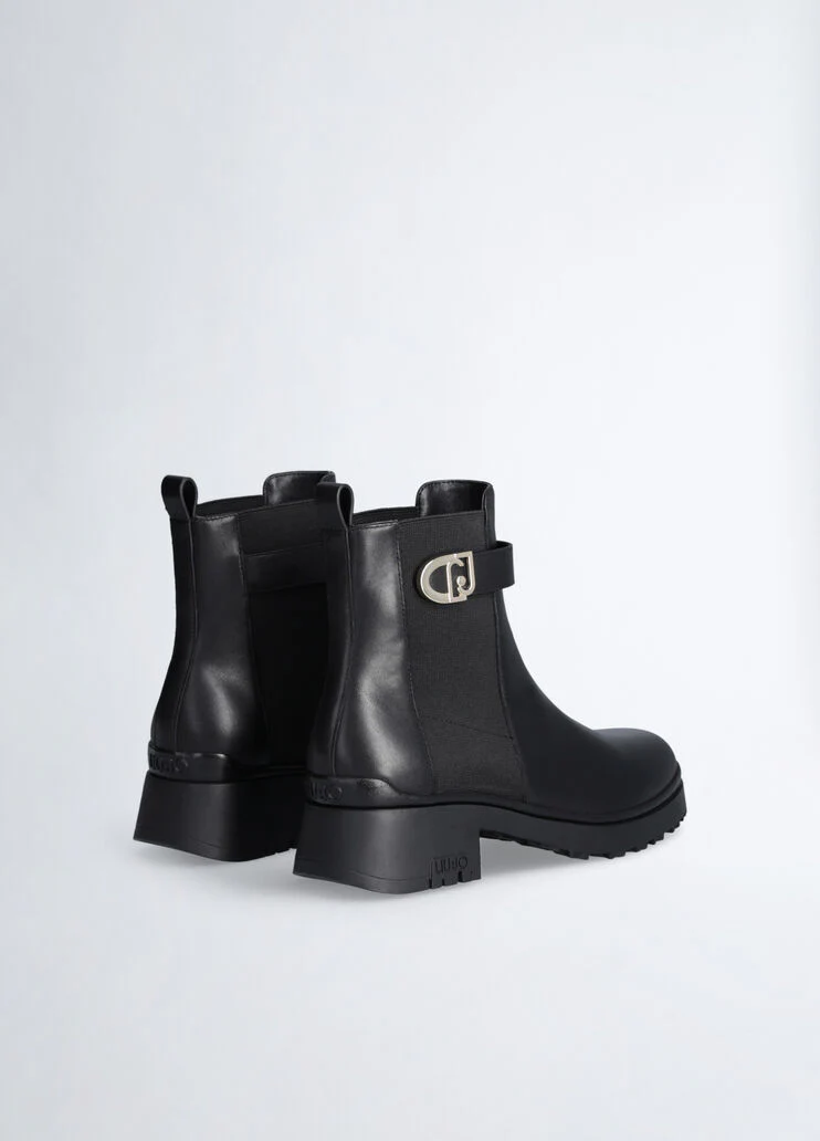 Black leather ankle boots with logo