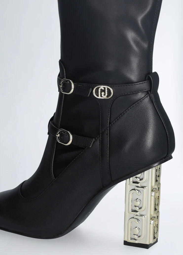Ankle boots with branded heel