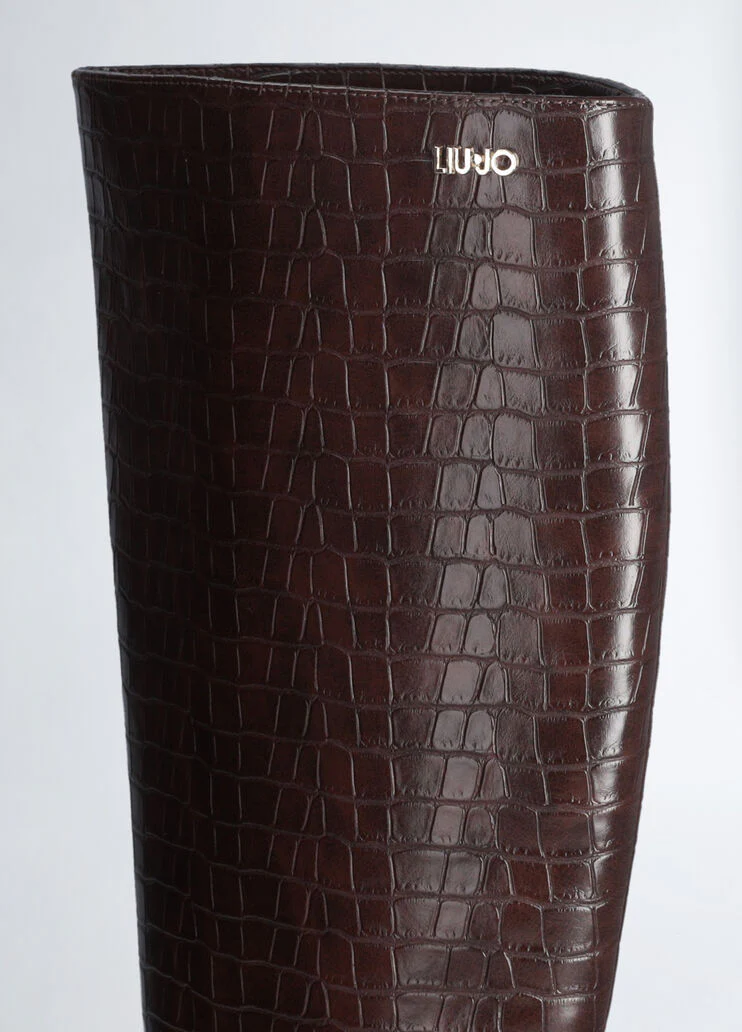 Crocodile-print knee-high boots