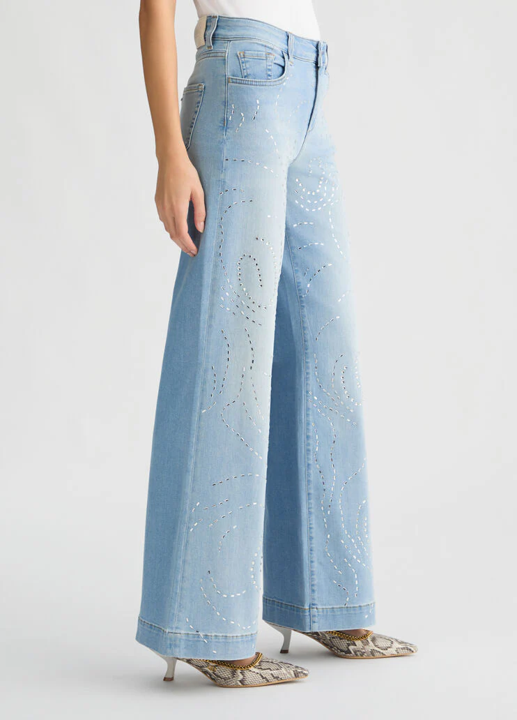 Flared jeans with studs