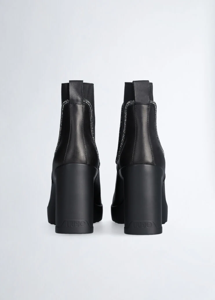 Black leather ankle boots with rhinestones