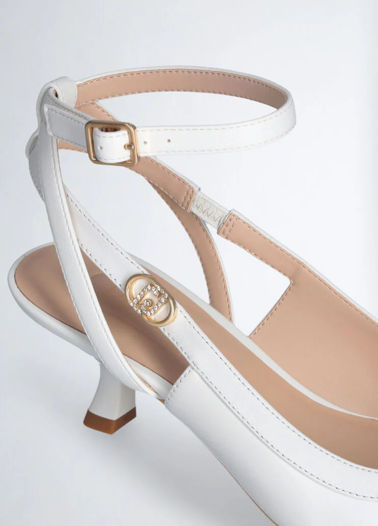 White slingbacks with low heel