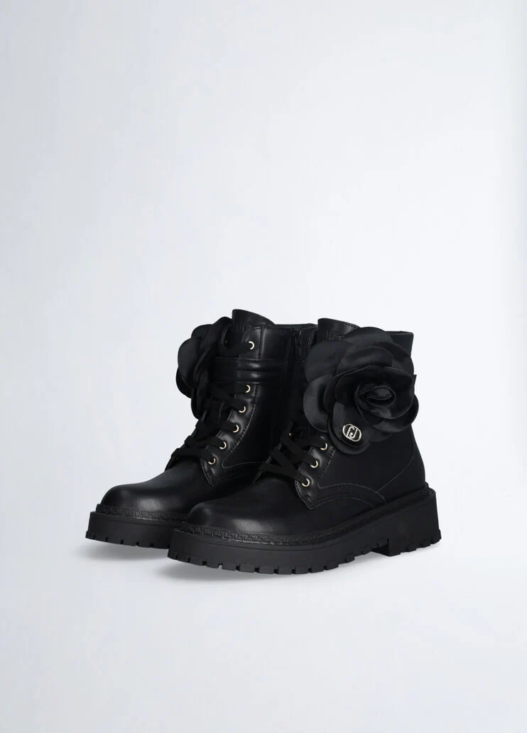 Leather combat boots with flower detail