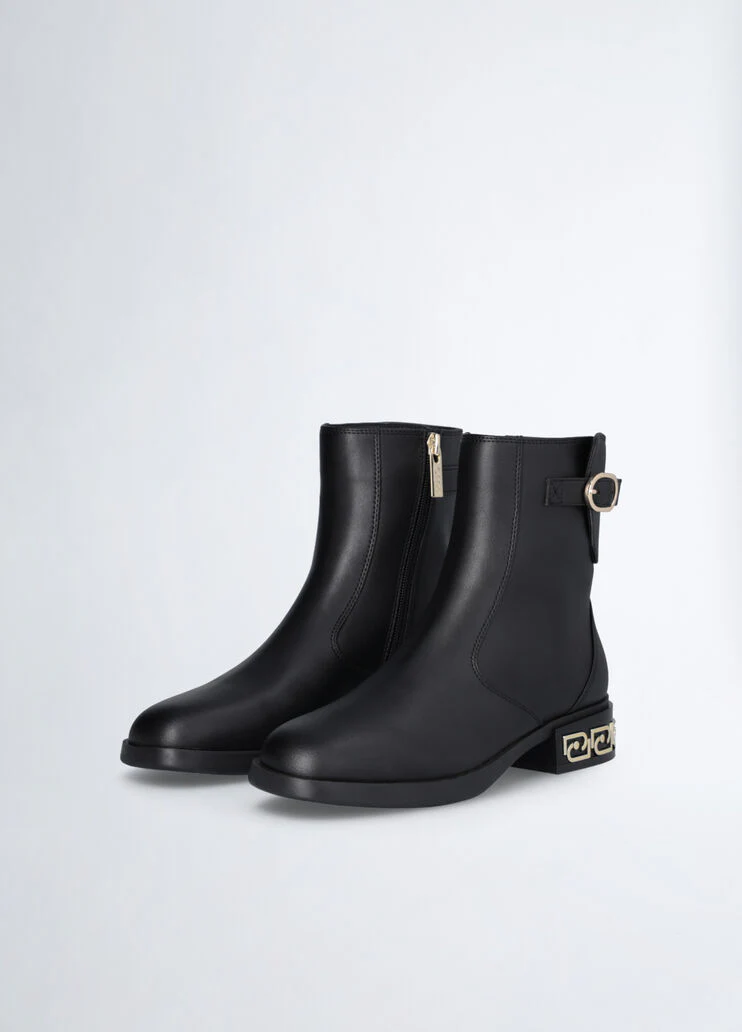 Black ankle boots with buckle