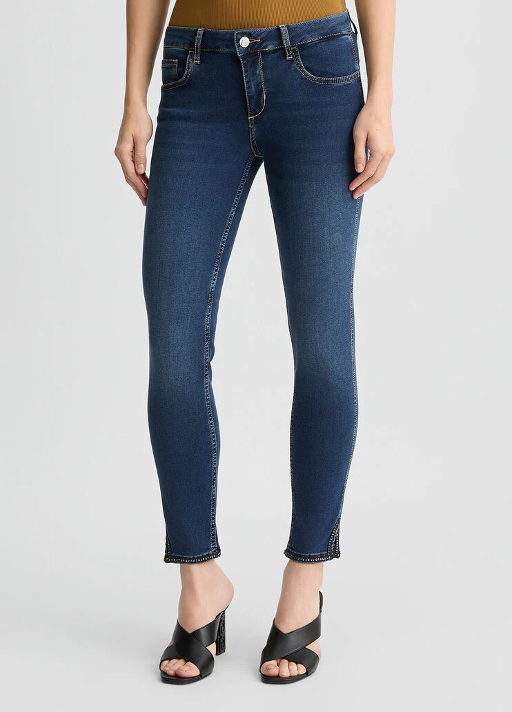 Dark blue skinny jeans with slit