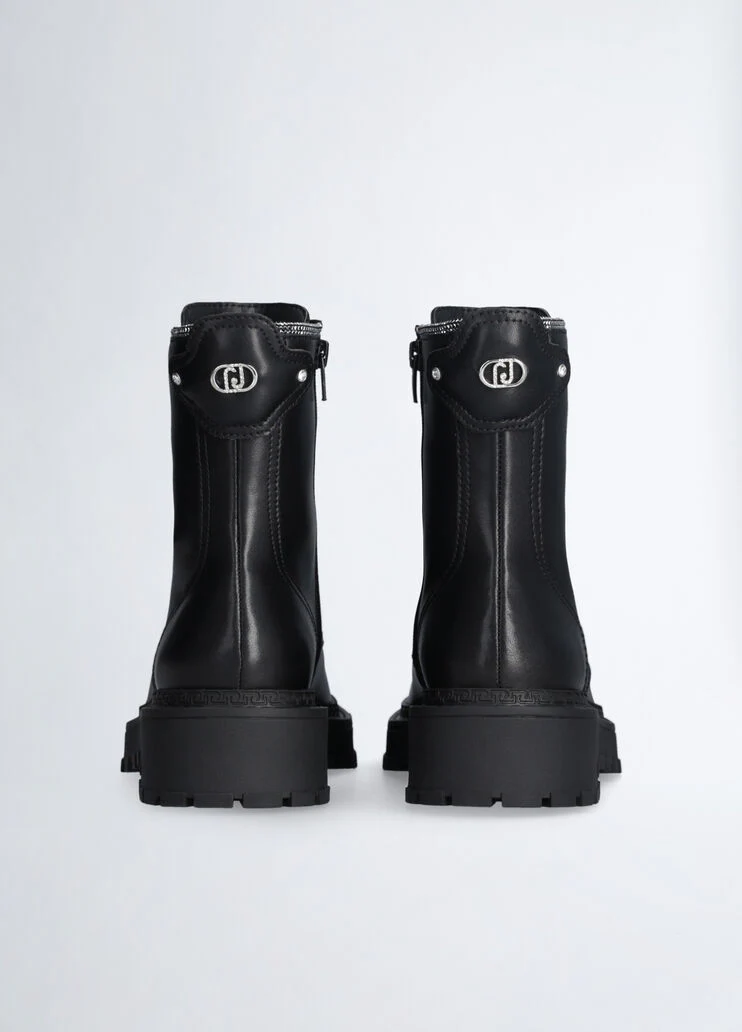 Combat boots with rhinestone trim