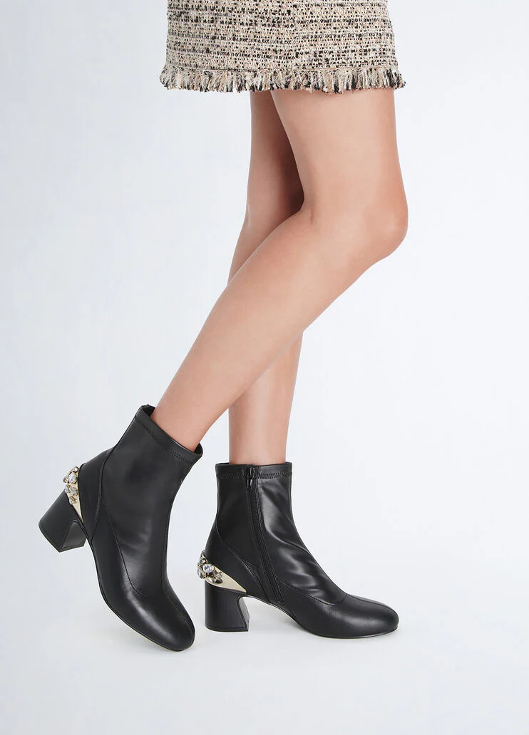 Black ankle boots with bejewelled gemstones
