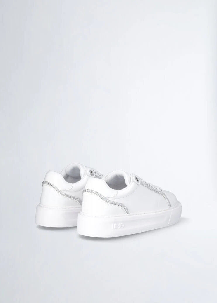 White sneakers with rhinestone trims