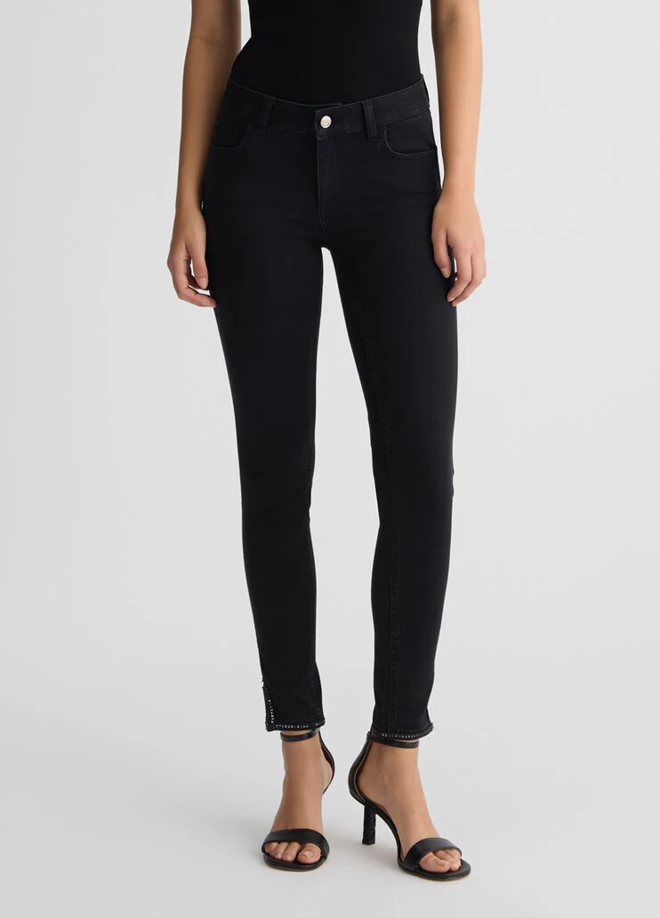 Black skinny jeans with slit