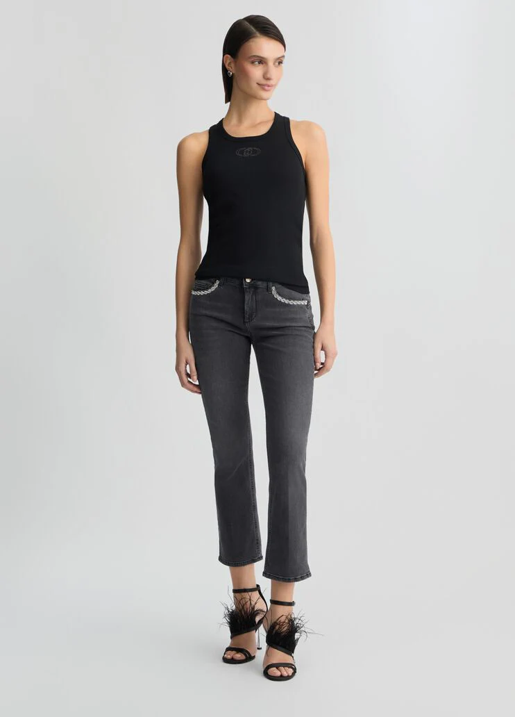 Black bootcut jeans with rhinestones
