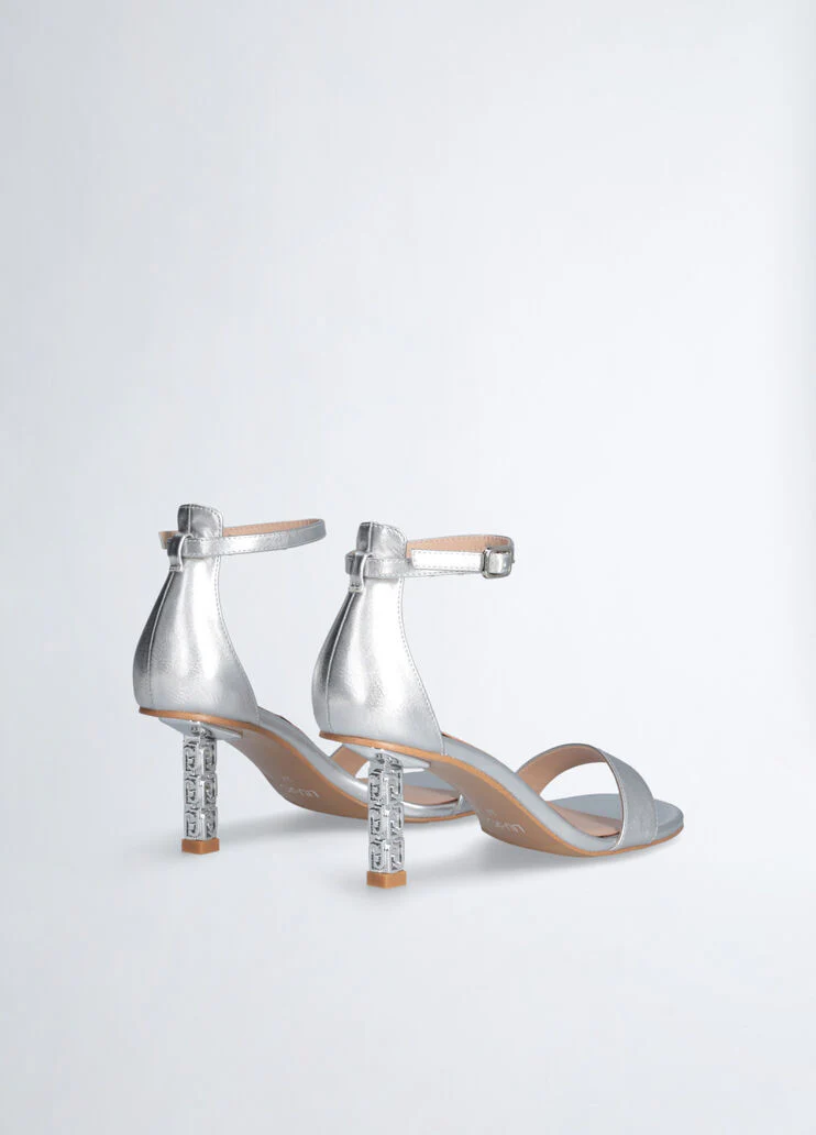 Sandals with branded heel