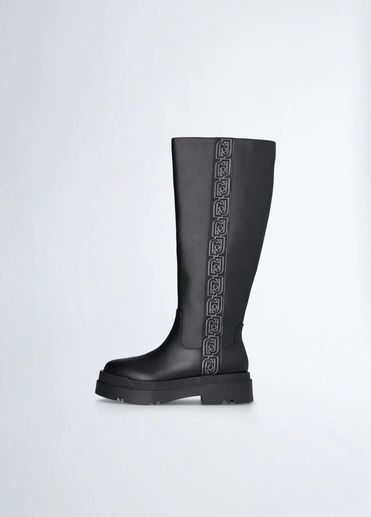 Black platform boots with logo