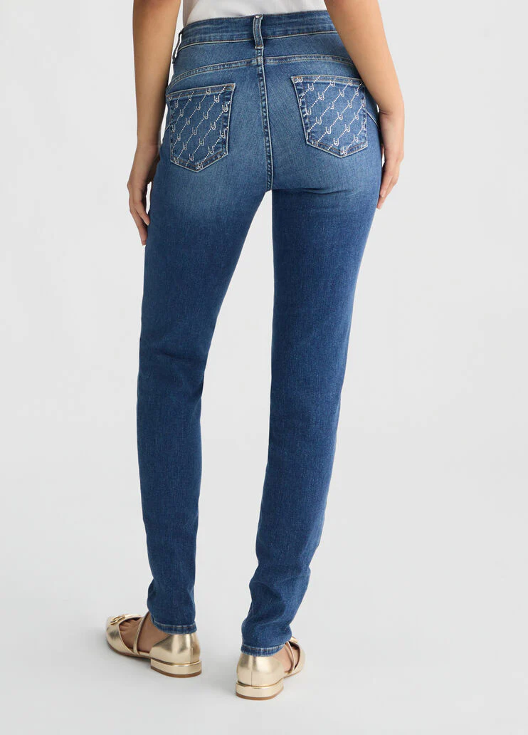 Blue skinny jeans with rhinestones