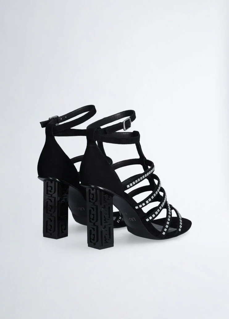 Sandals with branded heel