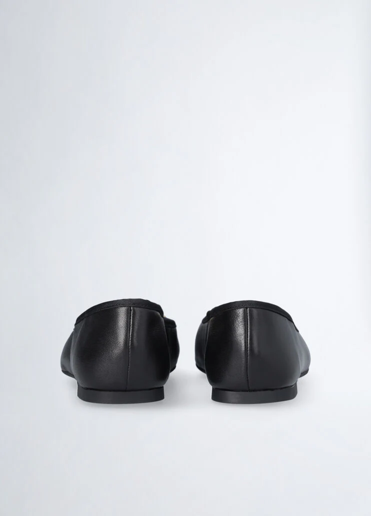 Black leather ballet flats