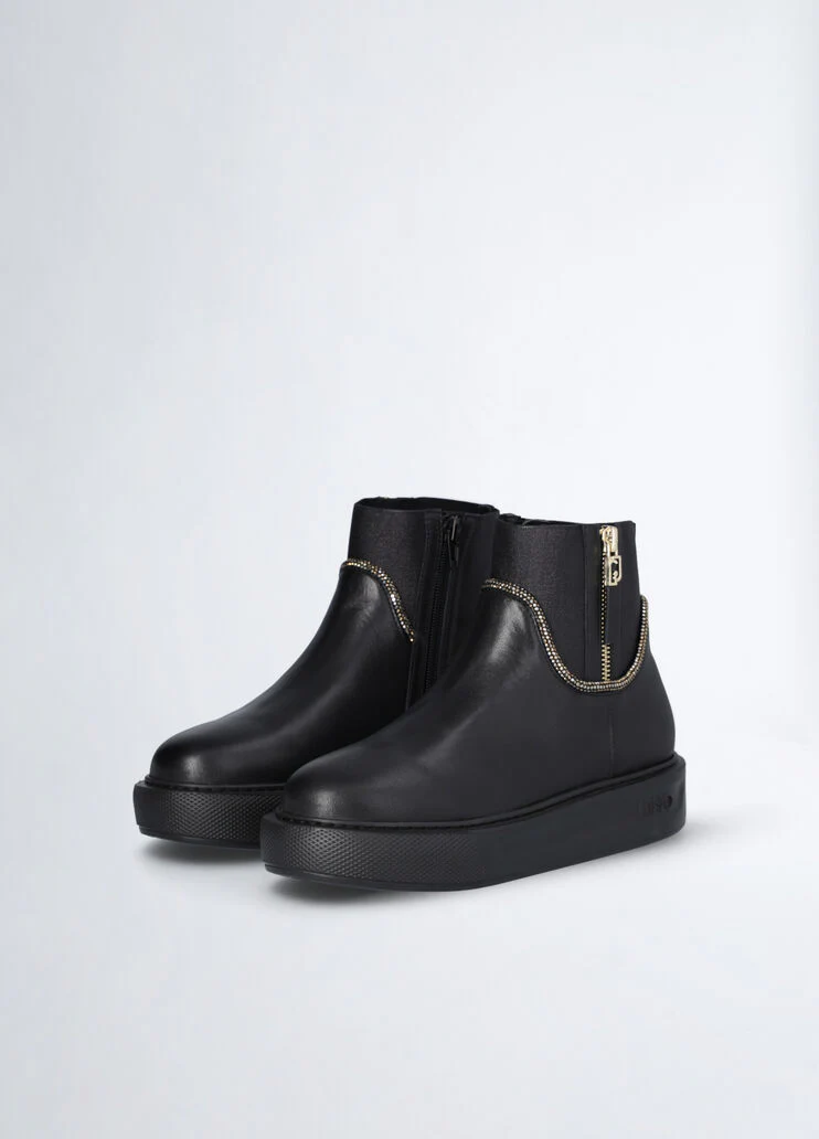 Black leather ankle boots with rhinestones