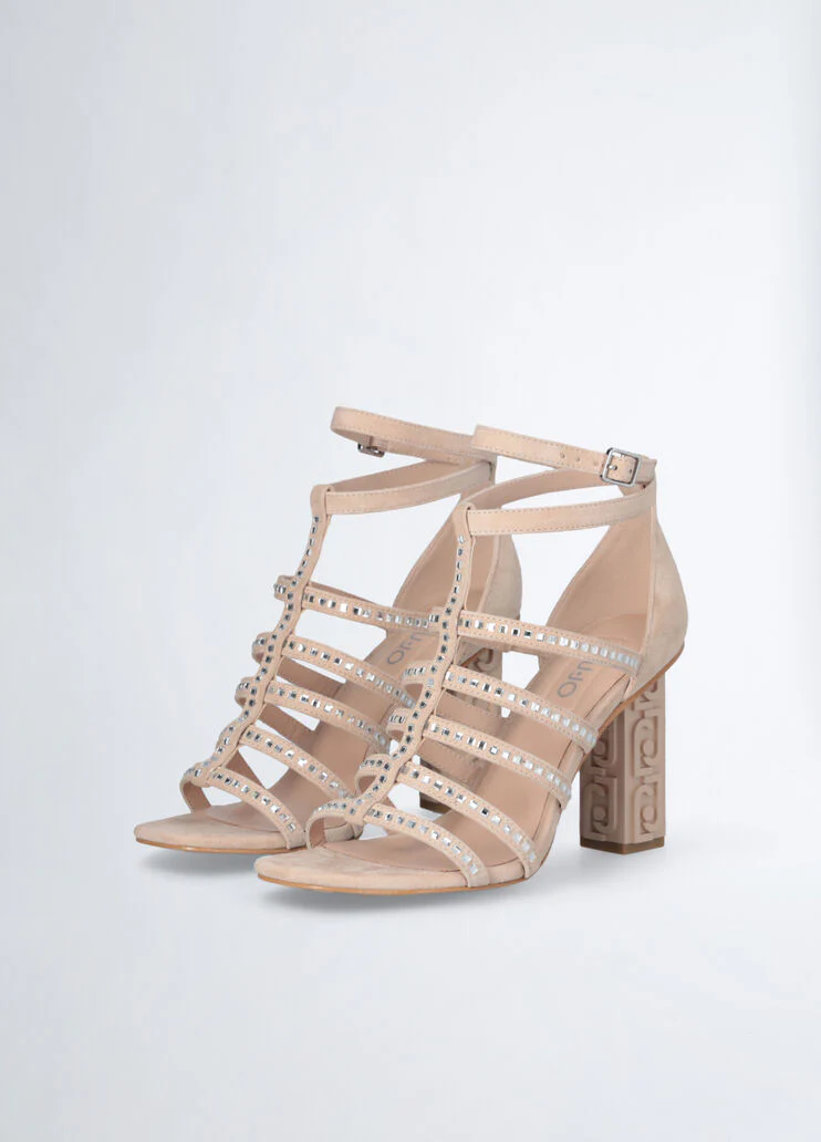 Sandals with branded heel