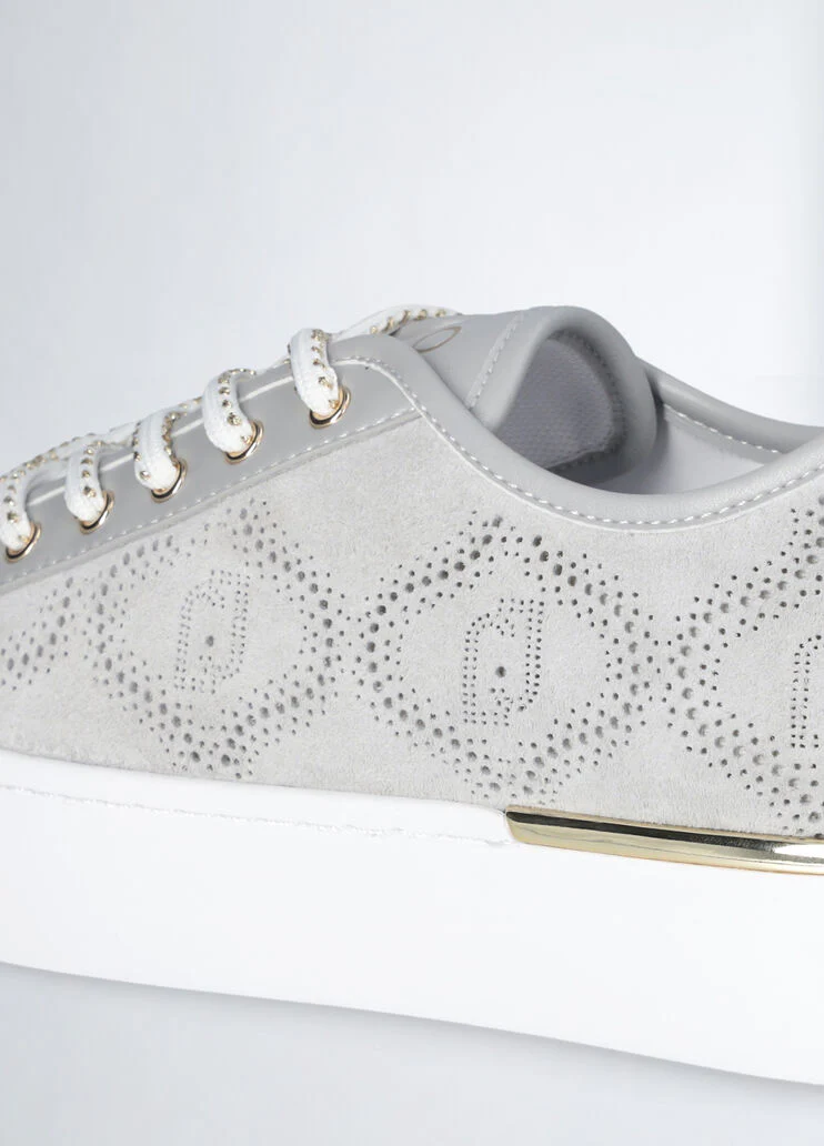 Sneakers with perforated weave
