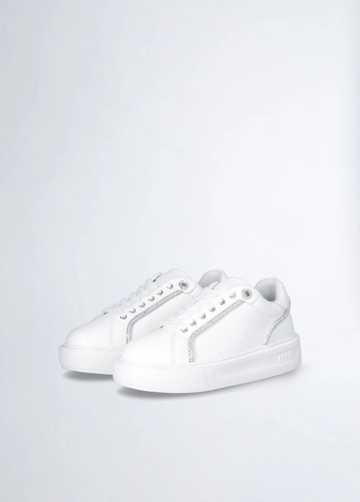 White sneakers with rhinestone trims
