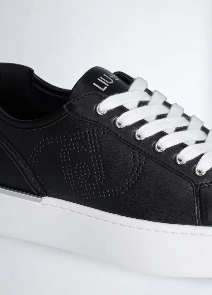 Leather sneakers with openwork logo