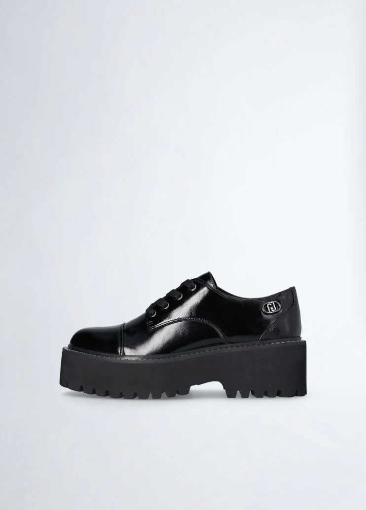 Black patent leather platform shoes