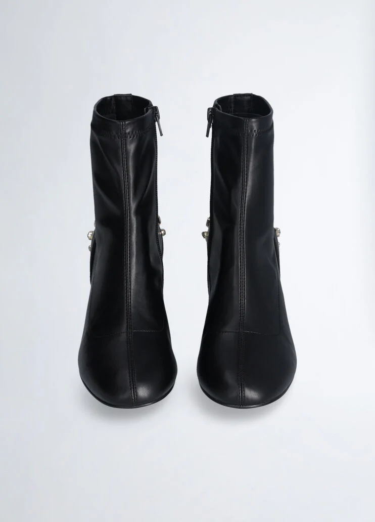 Black ankle boots with bejewelled gemstones