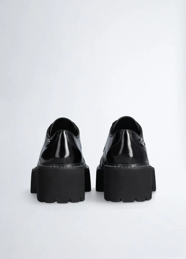 Black patent leather platform shoes