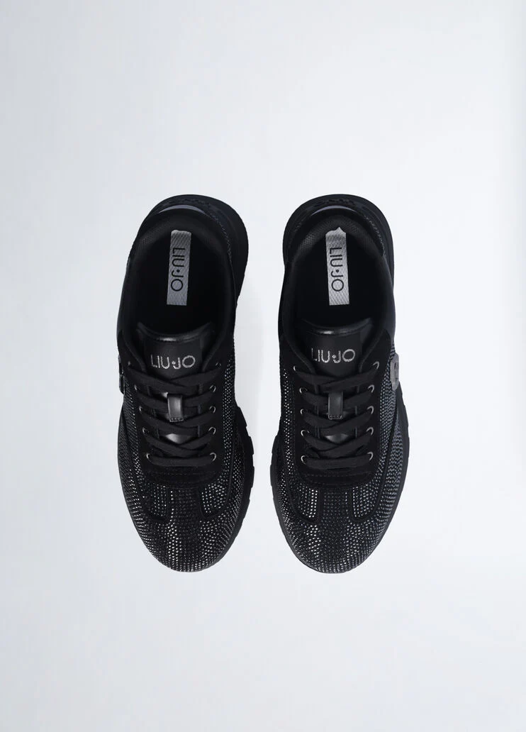Black sneakers with all-over rhinestones