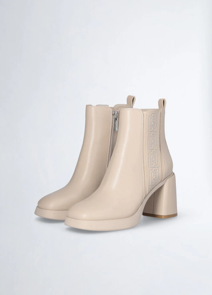 Beige ankle boots with logo