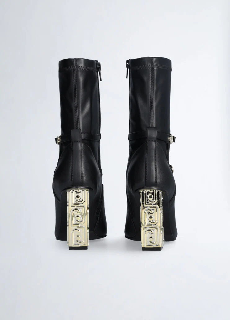 Ankle boots with branded heel