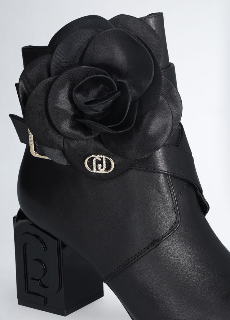 Leather ankle boot with flower detail