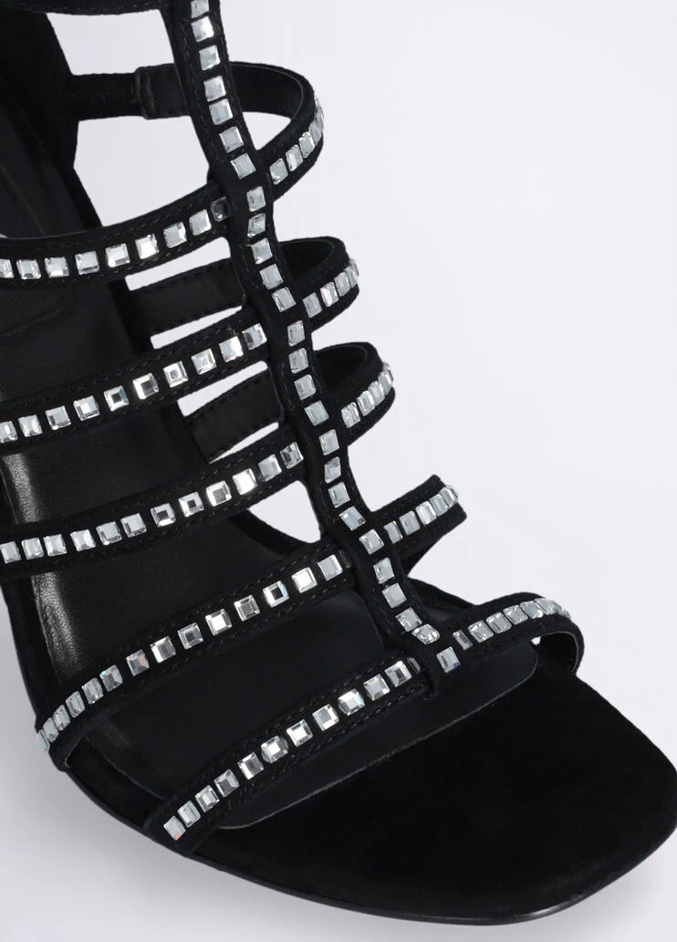 Sandals with branded heel