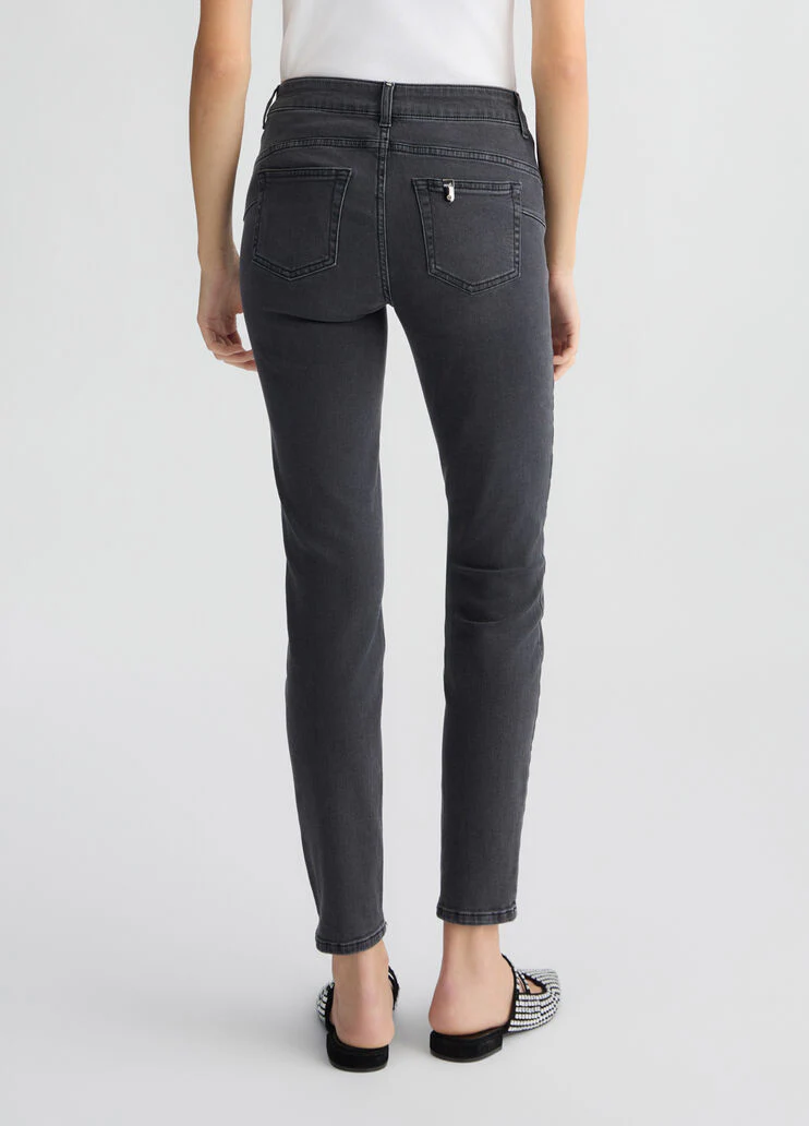 Grey skinny jeans with rhinestones