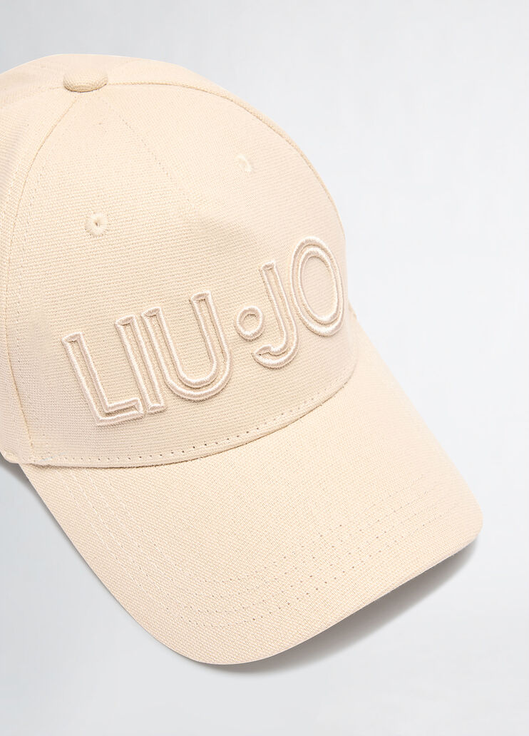 Champagne-coloured baseball cap
