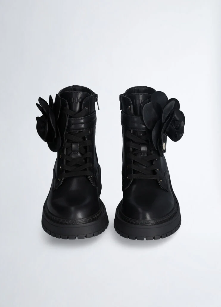 Leather combat boots with flower detail