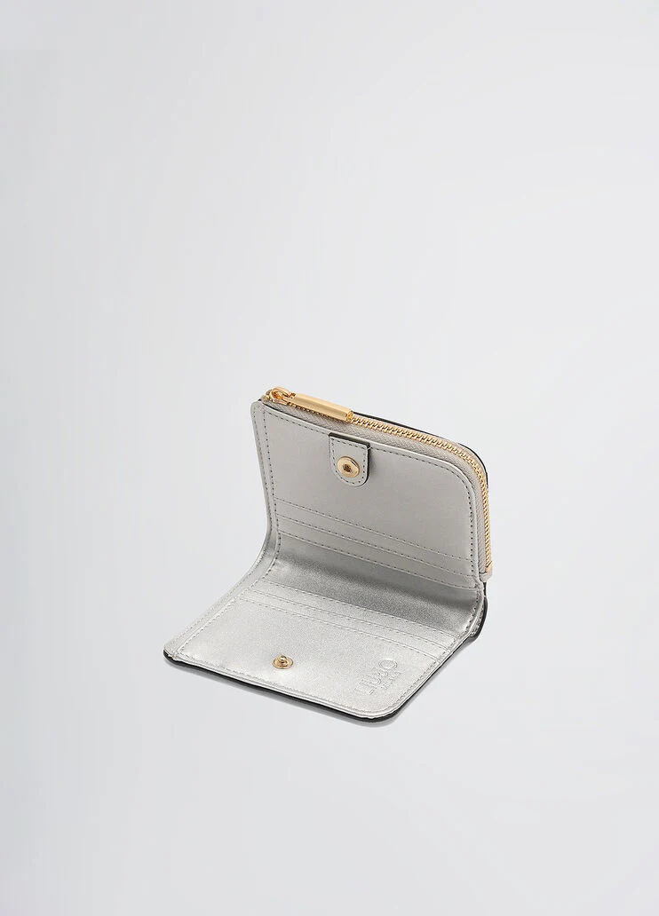 Card holder with zip
