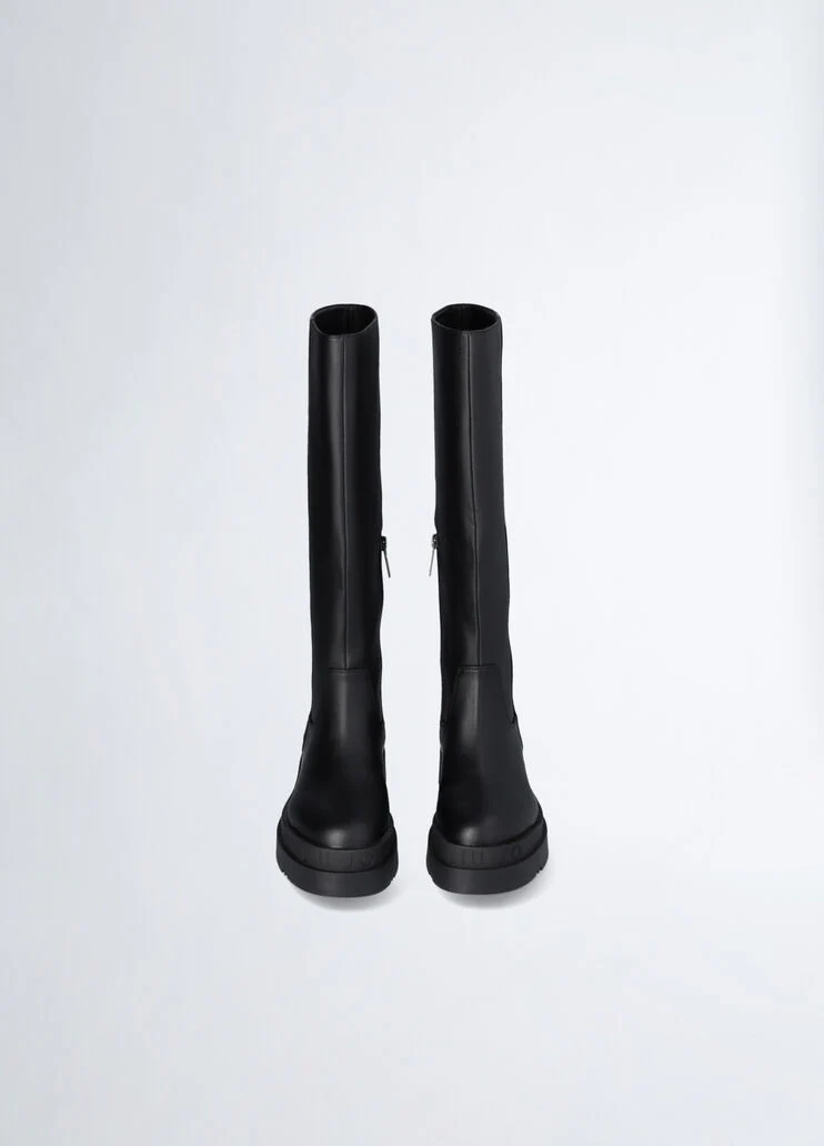 Black platform boots with logo