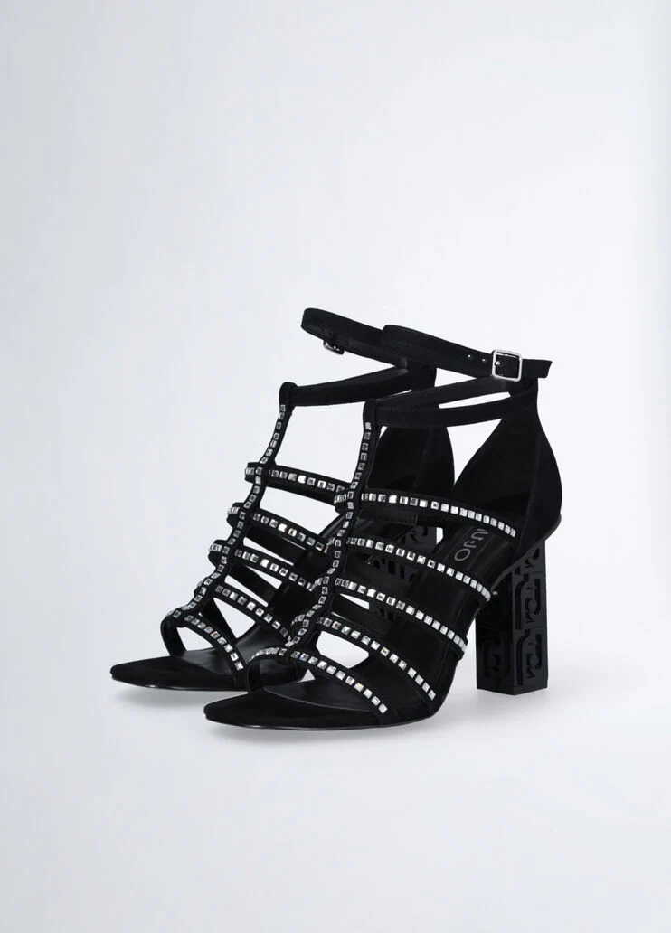 Sandals with branded heel