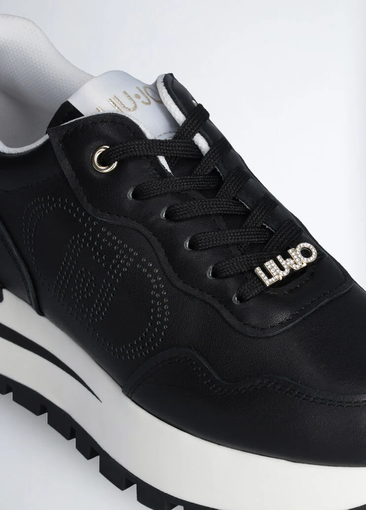 Leather sneakers with openwork logo