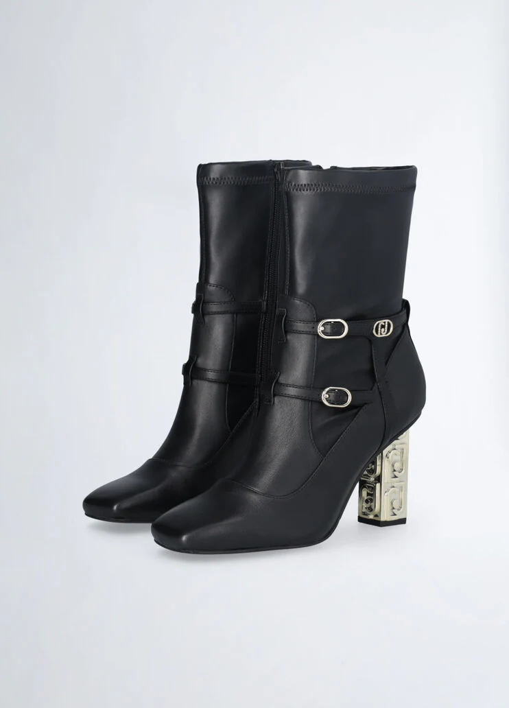 Ankle boots with branded heel