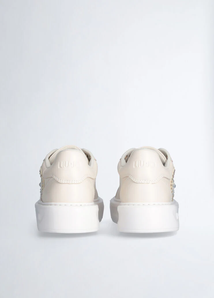 Sneakers with jewel logo