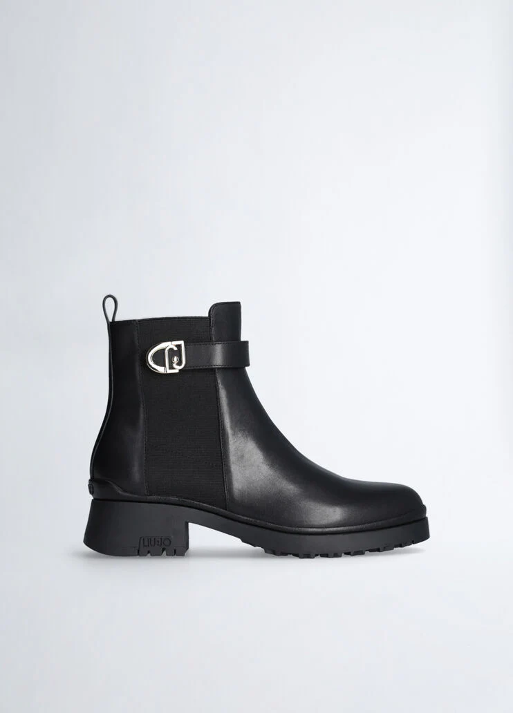 Black leather ankle boots with logo