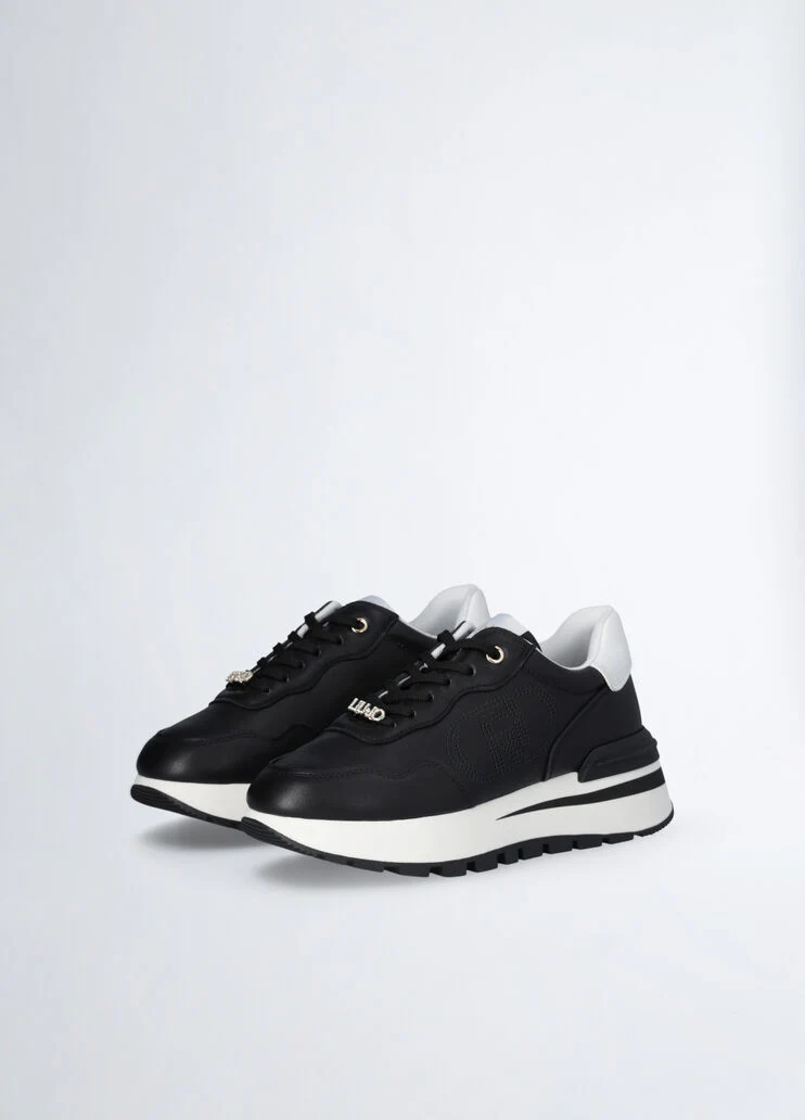 Leather sneakers with openwork logo