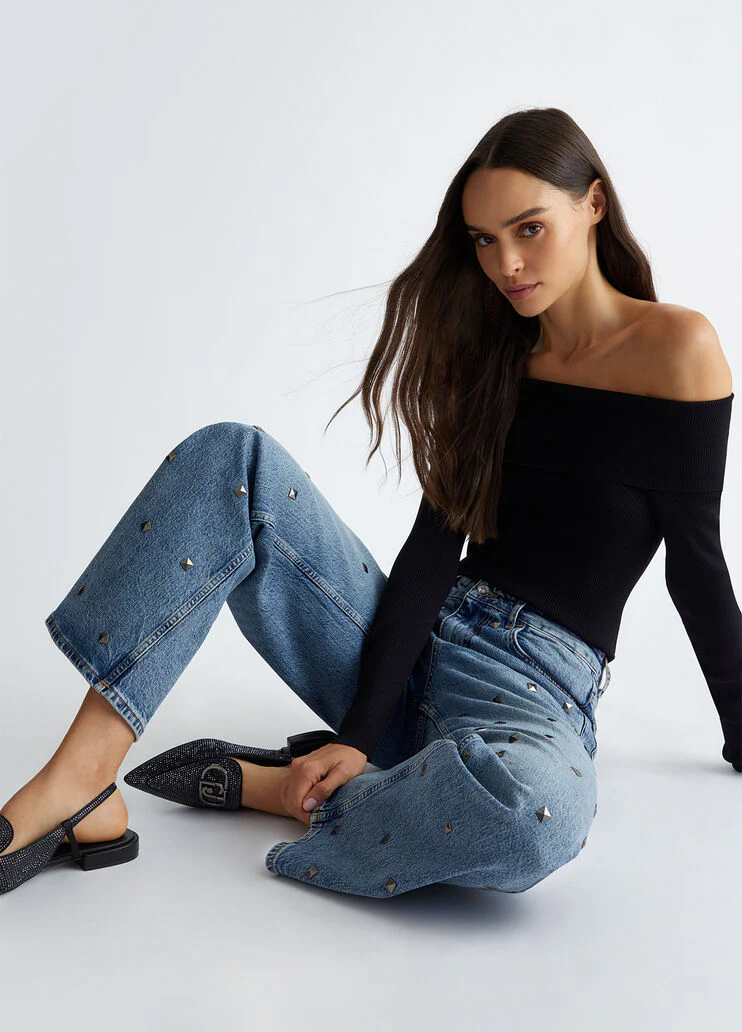 Flared jeans with studs