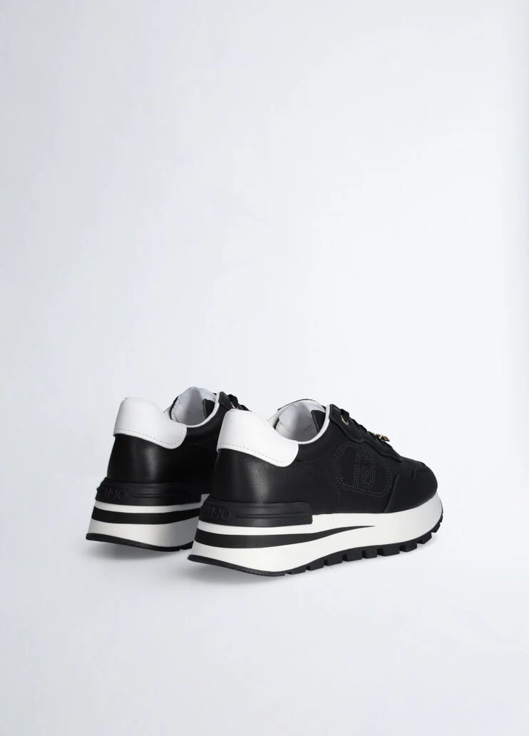 Leather sneakers with openwork logo