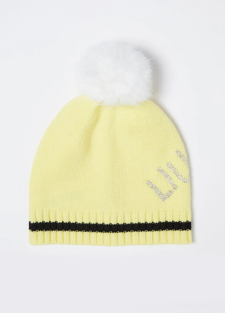 Yellow hat with pom-pom