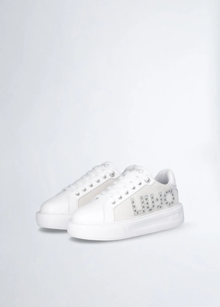 White sneakers with bejewelled logo
