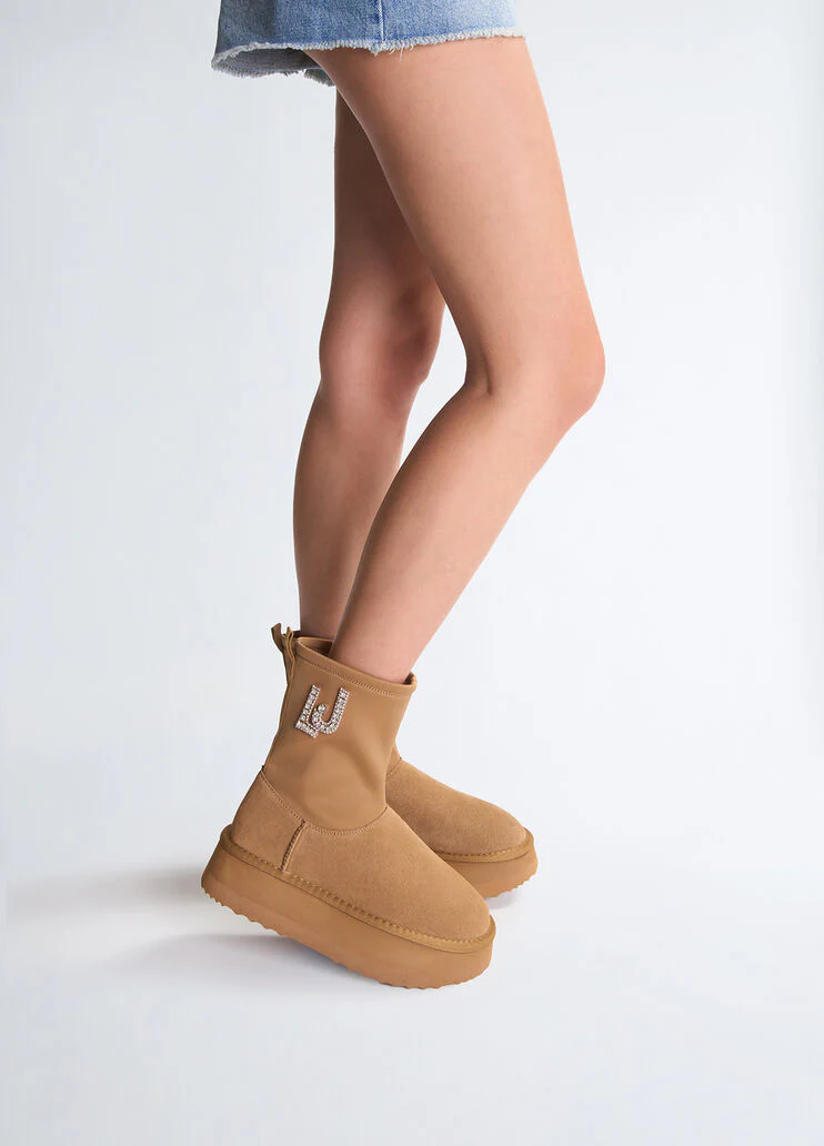 Warm ankle boots with bejewelled logo