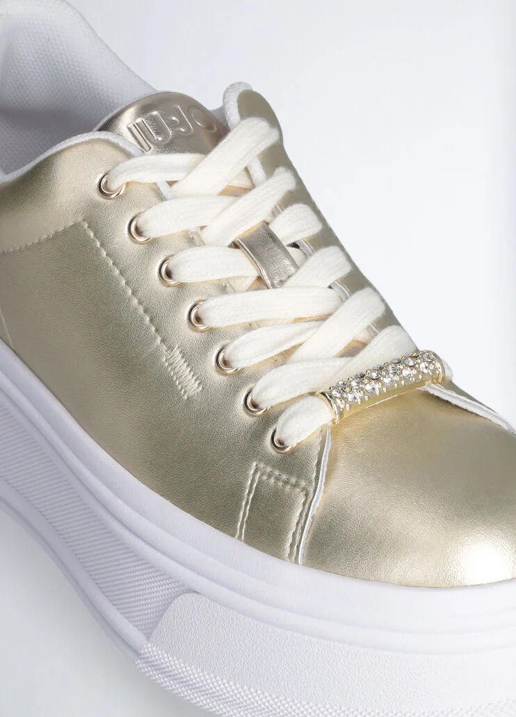 Gold leather platform sneakers