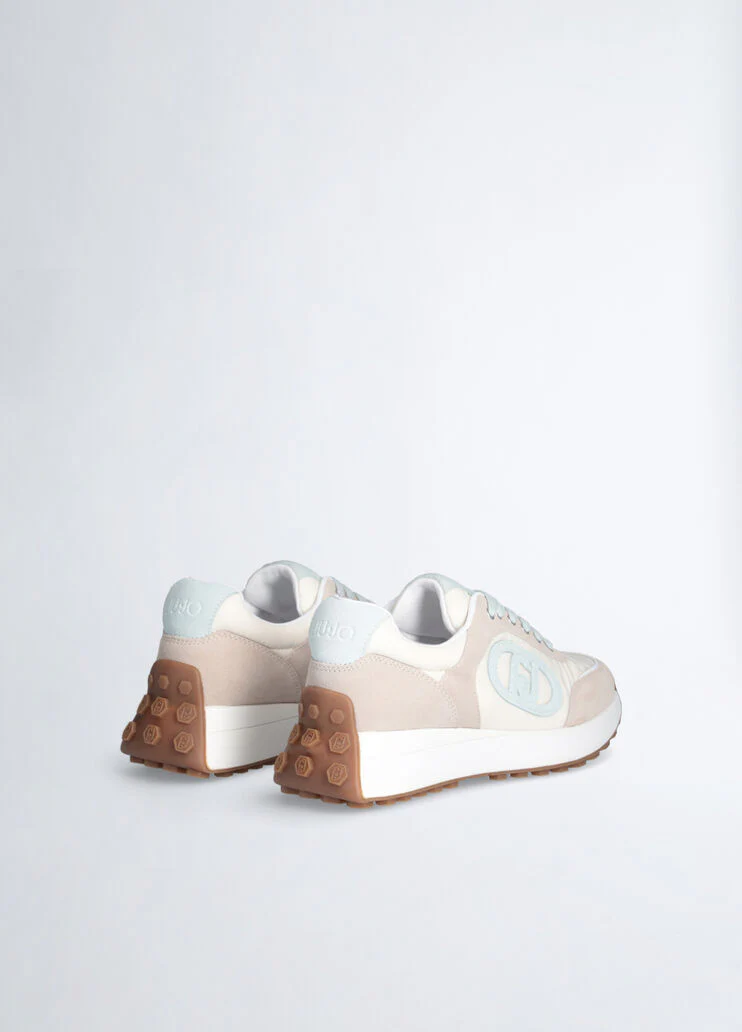 Beige sneakers with light blue logo